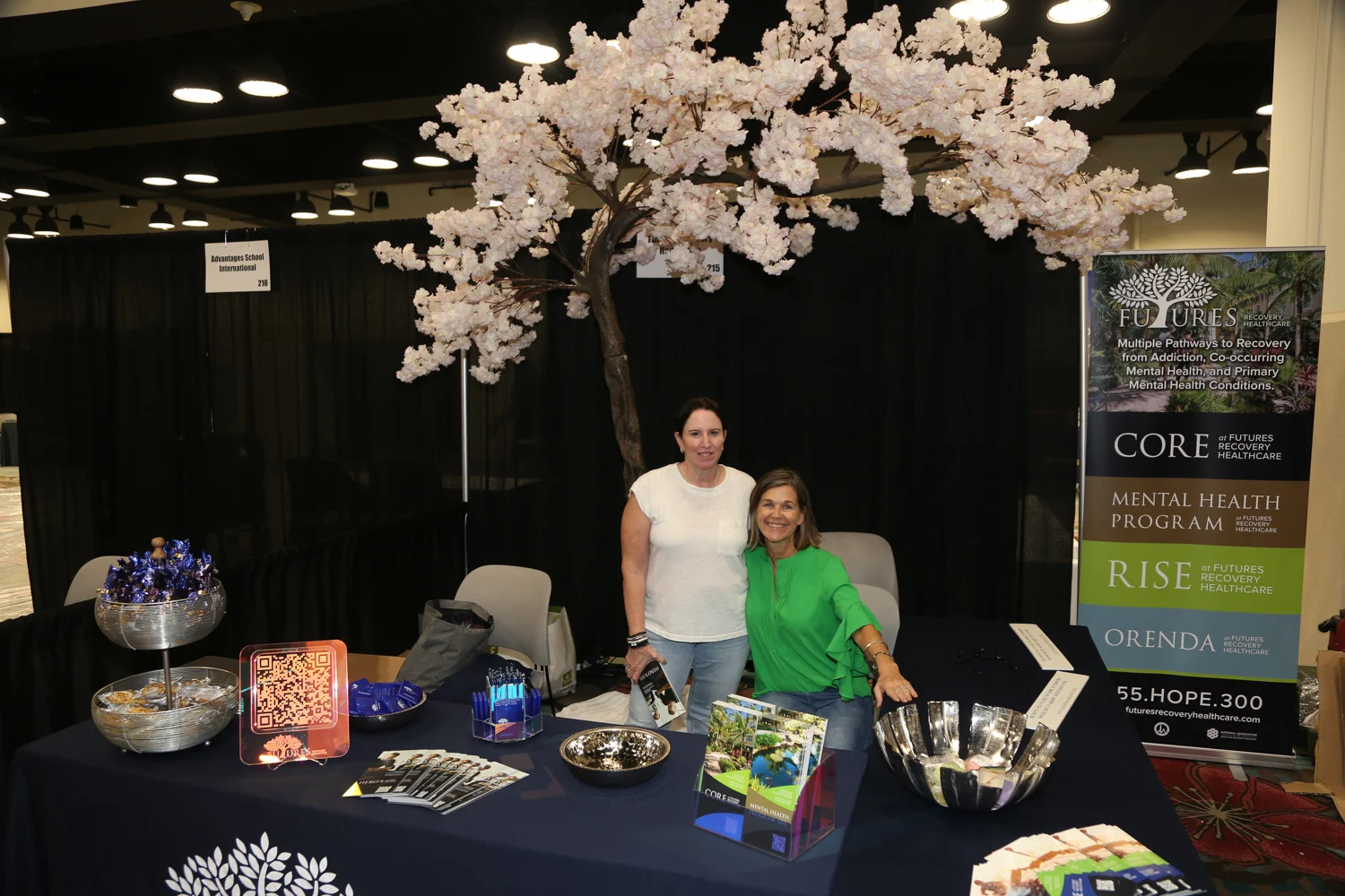 The Global Exchange Conference Exhibition Hall - Women on a stand